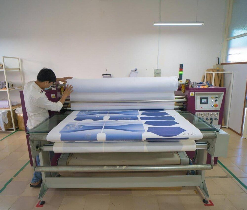 young-asian-male-worker-technician-wearing-medical-mask-make-object-sublimation-heat-press_620624-1346-transformed-1
